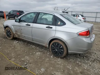 2009 Ford Focus S with VIN 1FAHP34N19W231625, listed as a Copart auction lot 52535085 with 126,487 mi miles and Non Repairable. Bid and sale history available at carsss.com. Image 2.