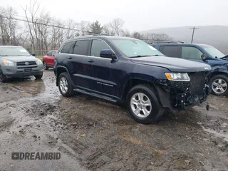 2014 Jeep Grand Cherokee Laredo with VIN 1C4RJFAGXEC109865, listed as a IAAI auction lot 41971070 with 129,460 mi miles. Bid and sale history available at carsss.com. Image 1.