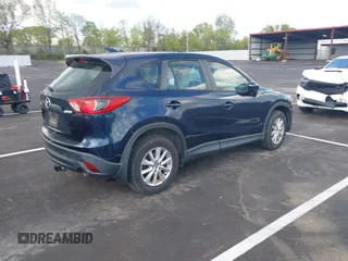 2016 Mazda CX-5 Sport with VIN JM3KE2BY3G0740488, listed as a IAAI auction lot 42000449 with 43,009 mi miles. Bid and sale history available at carsss.com. Image 4.