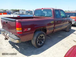 1999 Chevrolet Silverado 1500 LT with VIN 2GCEK19T9X1145877, listed as a IAAI auction lot 41985023 with 241,622 mi miles. Bid and sale history available at carsss.com. Image 4.