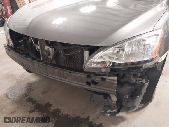 2015 Nissan Sentra S with VIN 3N1AB7AP1FY343386, listed as a IAAI auction lot 41447807 with 87,700 mi miles and . Bid and sale history available at DreamBid. Image 6.