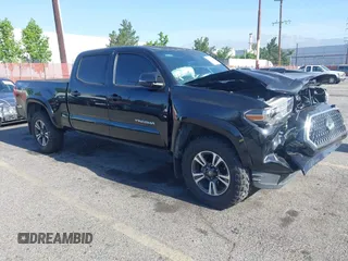 2018 Toyota Tacoma SR5 with VIN 3TMDZ5BN4JM038309, listed as a IAAI auction lot 42330682 with 92,100 mi miles and . Bid and sale history available at DreamBid. Image 1.