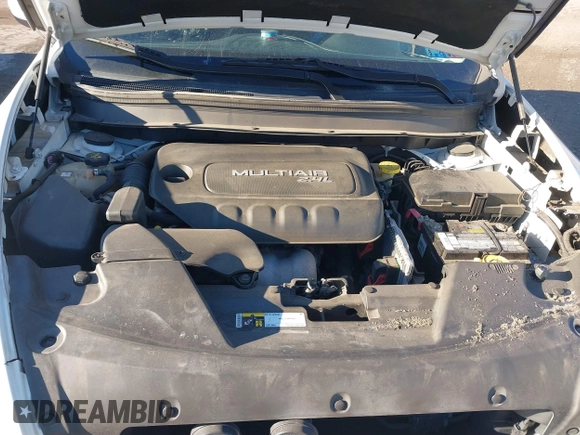 2015 Jeep Cherokee Latitude with VIN 1C4PJMCB3FW734573, listed as a IAAI auction lot 41825561 with 141,250 mi miles. Bid and sale history available at carsss.com. Image 10.
