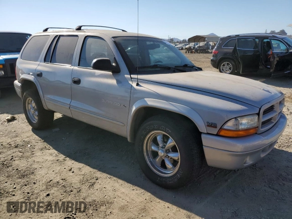 2000 Dodge Durango z VIN 1B4HR28Y4YF278422, wystawiony jako Copart lot #69119144 z przebiegiem 156 012 mil mil oraz Szkoda całkowita • Salvage title. Historia ofert i sprzedaży dostępna na DreamBid. Obrazek 4.