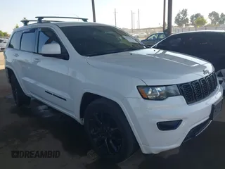 2018 Jeep Grand Cherokee Laredo E with VIN 1C4RJFAG5JC303228, listed as a IAAI auction lot 42375212 with 98,155 mi miles and . Bid and sale history available at DreamBid. Image 1.