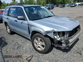 2003 Subaru Forester XS with VIN JF1SG65663H755380, listed as a Copart auction lot 69022344 with 148,658 mi miles and Salvage Title. Bid and sale history available at carsss.com. Image 4.