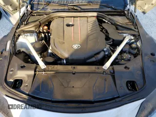 2022 Toyota Supra 3.0 z VIN WZ1DB0C04NW047447, wystawiony jako Copart lot #64258802 z przebiegiem Nie podano mil oraz . Historia ofert i sprzedaży dostępna na DreamBid. Obrazek 7.
