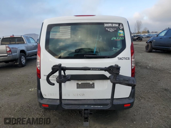 2018 Ford Transit Connect XL with VIN NM0LE7E75J1357681, listed as a Copart auction lot 82233674 with 90,725 mi miles and Salvage title. Bid and sale history available at DreamBid. Image 6.
