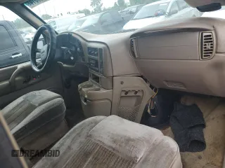 2003 GMC Safari z VIN 1GDEL19XX3B510573, wystawiony jako Copart lot #68429614 z przebiegiem Nie podano mil oraz Szkody całkowita. Historia ofert i sprzedaży dostępna na DreamBid. Obrazek 8.