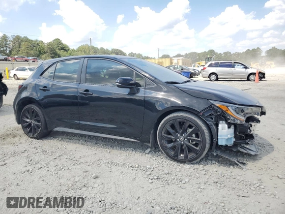 2022 Toyota Corolla Hatchback SE with VIN JTND4MBE3N3172594, listed as a Copart auction lot 69259454 with 33,925 mi miles and Salvage Title. Bid and sale history available at carsss.com. Image 4.