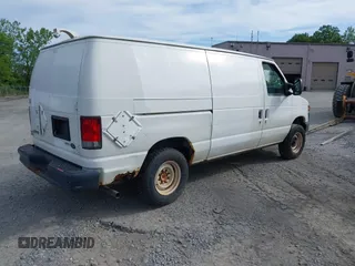 2010 Ford Econoline Cargo Commercial with VIN 1FTNE1EW1ADA91803, listed as a IAAI auction lot 42449203 with 183,537 mi miles and . Bid and sale history available at DreamBid. Image 4.