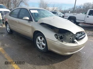 2000 Ford Taurus SE z VIN 1FAFP53U4YG125643, wystawiony jako IAAI lot #41864219 z przebiegiem 94 189 mil mil oraz . Historia ofert i sprzedaży dostępna na DreamBid. Obrazek 1.