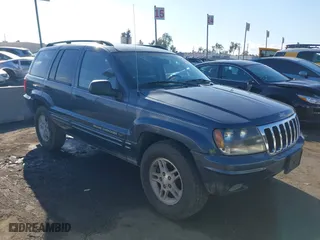 2002 Jeep Grand Cherokee Laredo with VIN 1J4GW48N72C261741, listed as a IAAI auction lot 40972222 with 174,516 mi miles. Bid and sale history available at carsss.com. Image 1.