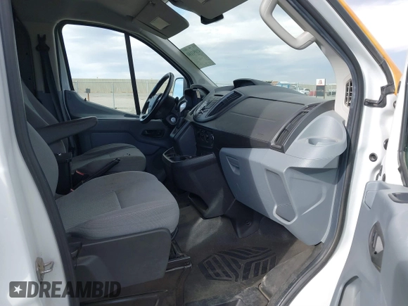 2016 Ford Transit Cargo z VIN 1FTYE1YM2GKB18602, wystawiony jako IAAI lot #41091180 z przebiegiem 143 262 mil mil oraz . Historia ofert i sprzedaży dostępna na DreamBid. Obrazek 5.