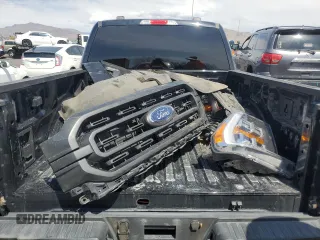2023 Ford F-150 XL z VIN 1FTFW1ED9PFA77211, wystawiony jako Copart lot #54770075 z przebiegiem 82 712 mil mil oraz Szkoda całkowita • Salvage title. Historia ofert i sprzedaży dostępna na DreamBid. Obrazek 12.