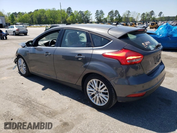 2016 Ford Focus Titanium with VIN 1FADP3N27GL201482, listed as a Copart auction lot 51768335 with 54,463 mi miles and Salvage title. Bid and sale history available at DreamBid. Image 2.