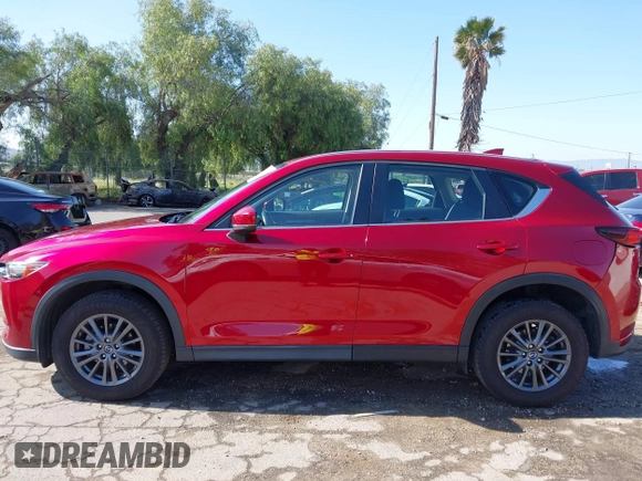 2019 Mazda CX-5 Sport with VIN JM3KFABM0K1633065, listed as a IAAI auction lot 41968786 with 90,407 mi miles and . Bid and sale history available at DreamBid. Image 14.