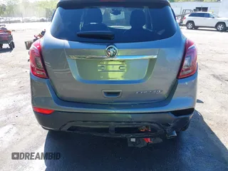 2019 Buick Encore Essence with VIN KL4CJGSM5KB869925, listed as a IAAI auction lot 41937487 with 105,702 mi miles. Bid and sale history available at carsss.com. Image 6.