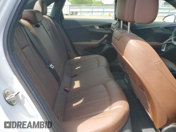 2018 Audi A4 Premium с VIN WAUDNAF41JA096443, выставлен на аукционе Copart как лот 55079265 с пробегом 125 294 миль миль и Списание • Salvage title. История ставок и продаж доступна на DreamBid. Изображение 10.