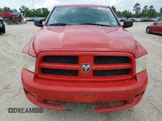 2012 Ram 1500 Express with VIN 3C6JD6AT4CG201072, listed as a Copart auction lot 60130655 with 147,324 mi miles and Salvage title. Bid and sale history available at DreamBid. Image 5.