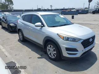 2019 Hyundai Tucson Value z VIN KM8J33A44KU850106, wystawiony jako IAAI lot #42513799 z przebiegiem 121 250 mil mil oraz . Historia ofert i sprzedaży dostępna na DreamBid. Obrazek 1.