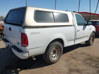 2002 Ford F-150 XL with VIN 1FTRF17282KA85955, listed as a IAAI auction lot 41424999 with 183,700 mi miles and . Bid and sale history available at DreamBid. Image 4.