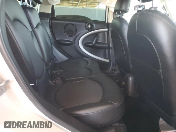 2015 MINI Countryman with VIN WMWZB3C50FWR45253, listed as a Copart auction lot 63608655 with 123,701 mi miles and Salvage title. Bid and sale history available at DreamBid. Image 11.