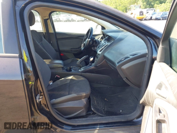 2013 Ford Focus SE with VIN 1FADP3F21DL230177, listed as a IAAI auction lot 42579815 with 243,525 mi miles and . Bid and sale history available at DreamBid. Image 5.
