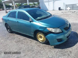 2009 Toyota Corolla with VIN JTDBL40EX99034801, listed as a IAAI auction lot 41943591 with 204,674 mi miles. Bid and sale history available at carsss.com. Image 1.