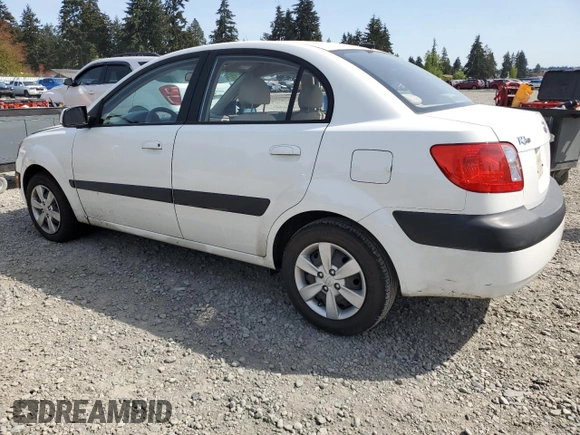 2009 Kia Rio LX with VIN KNADE223896456292, listed as a Copart auction lot 54990605 with 61,220 mi miles and Salvage Title. Bid and sale history available at DreamBid. Image 2.