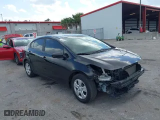 2018 Kia Forte LX with VIN 3KPFK4A78JE227114, listed as a IAAI auction lot 41977992 with 63,327 mi miles. Bid and sale history available at carsss.com. Image 1.