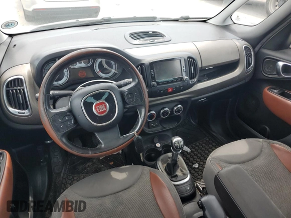 2014 FIAT 500L Trekking with VIN ZFBCFADH0EZ010311, listed as a Copart auction lot 62334095 with 139,917 mi miles and Salvage title. Bid and sale history available at DreamBid. Image 8.
