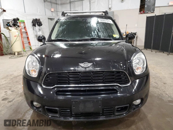 2013 MINI Countryman S ALL4 with VIN WMWZC5C55DWM15639, listed as a Copart auction lot 50991075 with 120,098 mi miles and Salvage Title. Bid and sale history available at DreamBid. Image 5.