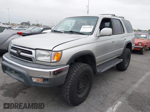 2000 Toyota 4Runner SR5 z VIN JT3HN86R9Y0288531, wystawiony jako IAAI lot #42157270 z przebiegiem 298 630 mil mil oraz . Historia ofert i sprzedaży dostępna na DreamBid. Obrazek 2.