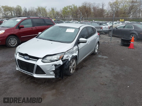 2012 Ford Focus SE z VIN 1FAHP3K27CL152803, wystawiony jako IAAI lot #42058556 z przebiegiem 181 717 mil mil oraz . Historia ofert i sprzedaży dostępna na DreamBid. Obrazek 2.