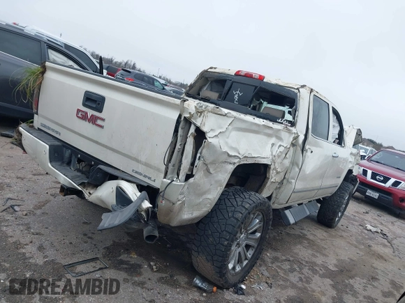2014 GMC Sierra 1500 Denali z VIN 3GTU2WEJ5EG492544, wystawiony jako IAAI lot #41644535 z przebiegiem 215 469 mil mil oraz . Historia ofert i sprzedaży dostępna na DreamBid. Obrazek 4.