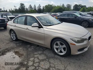 2013 BMW 3 Series 320i xDrive with VIN WBA3C3C50DF982982, listed as a Copart auction lot 62883045 with 189,875 mi miles and Clean title. Bid and sale history available at DreamBid. Image 4.