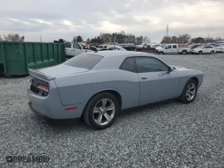 2020 Dodge Challenger SXT with VIN 2C3CDZAG9LH206682, listed as a Copart auction lot 80694704 with 63,275 mi miles and Salvage Title. Bid and sale history available at carsss.com. Image 3.