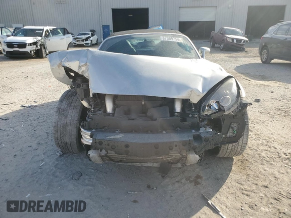 2009 Saturn Sky Red Line z VIN 1G8MT35X69Y104310, wystawiony jako Copart lot #87369754 z przebiegiem 62 428 mil mil oraz Szkody całkowita. Historia ofert i sprzedaży dostępna na DreamBid. Obrazek 5.