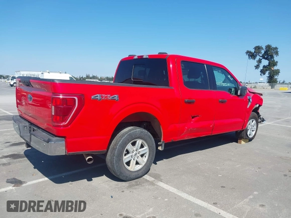 2021 Ford F-150 XL with VIN 1FTFW1E56MKD86209, listed as a IAAI auction lot 42700594 with 120,972 mi miles and . Bid and sale history available at DreamBid. Image 4.
