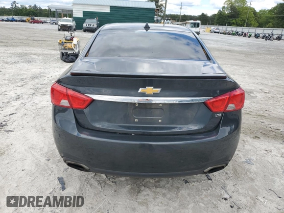 2014 Chevrolet Impala LTZ z VIN 2G1155S32E9156735, wystawiony jako Copart lot #55688325 z przebiegiem 129 710 mil mil oraz Szkoda całkowita • Salvage title. Historia ofert i sprzedaży dostępna na DreamBid. Obrazek 6.