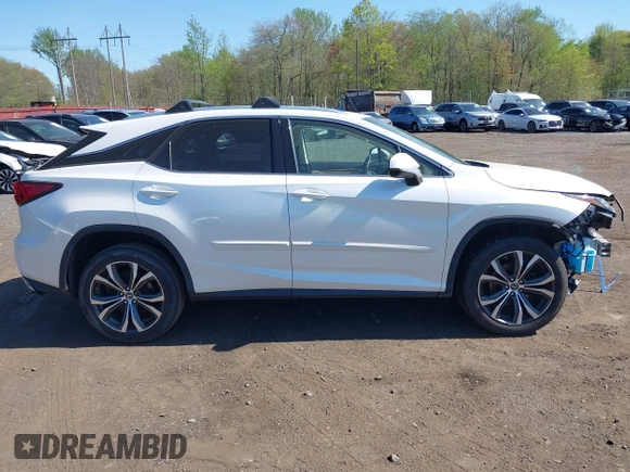 2019 Lexus RX 350 with VIN JTJBZMCA0K2041419, listed as a IAAI auction lot 42128084 with 98,994 mi miles and . Bid and sale history available at DreamBid. Image 13.