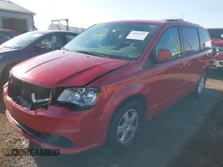 2013 Dodge Grand Caravan SXT z VIN 2C4RDGCG4DR635702, wystawiony jako IAAI lot #42092823 z przebiegiem 234 737 mil mil oraz . Historia ofert i sprzedaży dostępna na DreamBid. Obrazek 6.