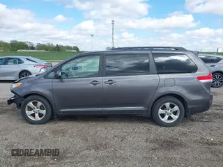 2012 Toyota Sienna LE AAS with VIN 5TDKK3DC5CS270481, listed as a IAAI auction lot 42093687 with 208,899 mi miles. Bid and sale history available at carsss.com. Image 14.