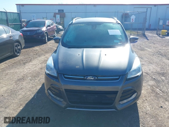 2015 Ford Escape Titanium with VIN 1FMCU9J9XFUB46843, listed as a IAAI auction lot 41800938 with 91,034 mi miles. Bid and sale history available at carsss.com. Image 12.