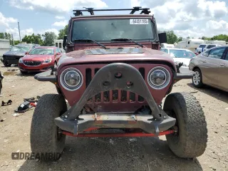 2002 Jeep Wrangler X with VIN 1J4FA39SX2P732881, listed as a Copart auction lot 64451185 with Not provided miles and Clean title. Bid and sale history available at DreamBid. Image 5.