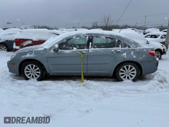 2010 Chrysler Sebring Touring with VIN 1C3CC4FB1AN135341, listed as a Copart auction lot 82492404 with Not Provided miles and Salvage Title. Bid and sale history available at carsss.com. Image 10.