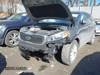2016 Kia Sorento LX with VIN 5XYPGDA39GG061748, listed as a IAAI auction lot 41720011 with 124,084 mi miles. Bid and sale history available at carsss.com. Image 6.