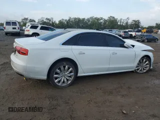 2017 Audi A8 L with VIN WAU44AFDXHN006499, listed as a Copart auction lot 74043014 with 73,043 mi miles and Salvage Title. Bid and sale history available at carsss.com. Image 3.