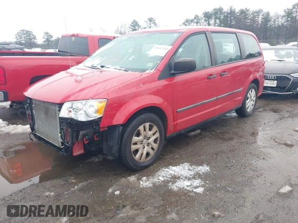 2014 Dodge Grand Caravan American Value with VIN 2C4RDGBG0ER452719, listed as a IAAI auction lot 41547145 with 151,636 mi miles and . Bid and sale history available at DreamBid. Image 2.